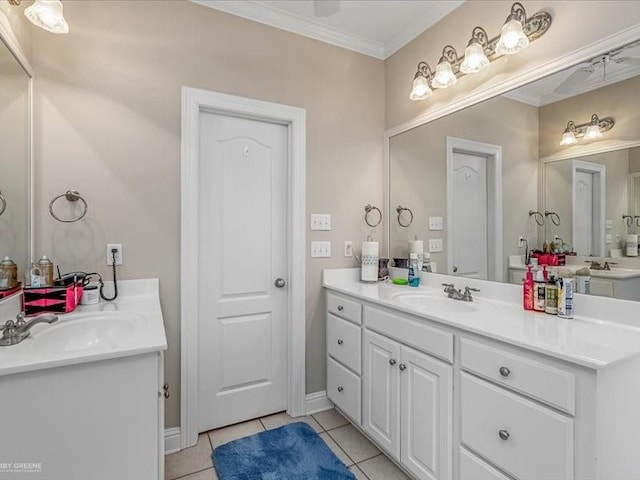 bathroom with vanity, tile patterned flooring, and crown molding