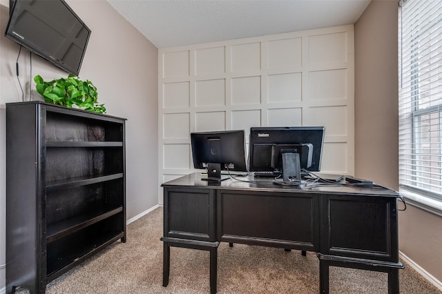 office with carpet flooring and baseboards