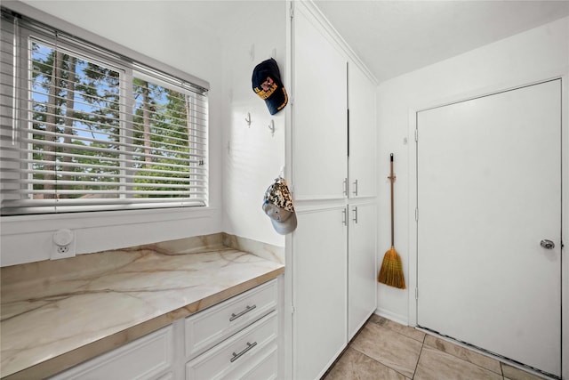 bathroom with tile patterned flooring