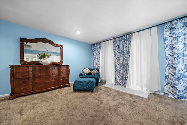 living area with light colored carpet