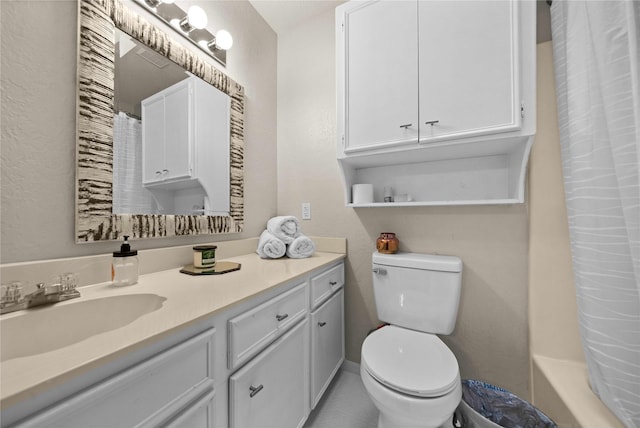 full bathroom with vanity, shower / tub combo, tile patterned floors, and toilet