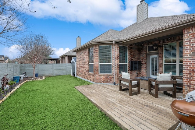 view of yard featuring a wooden deck and an outdoor hangout area