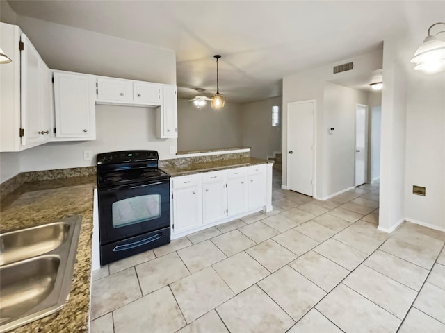 kitchen featuring sink, hanging light fixtures, white cabinets, light tile patterned flooring, and black range with electric cooktop