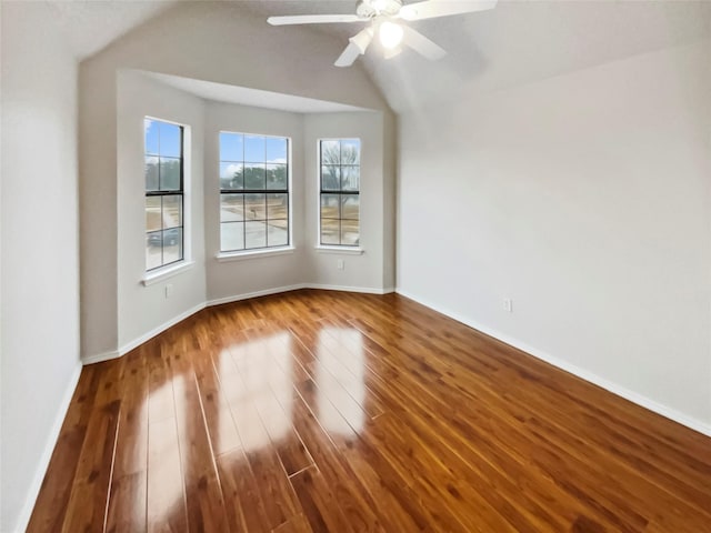 empty room featuring hardwood / wood-style flooring and ceiling fan