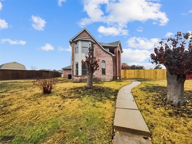 view of front of home with a front yard