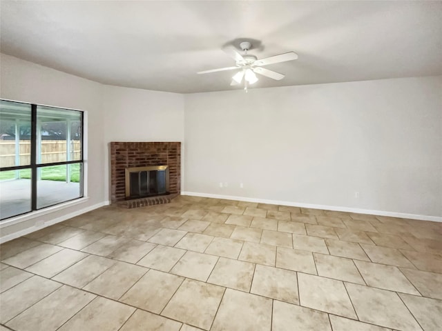 unfurnished living room featuring light tile patterned floors, a fireplace, and ceiling fan