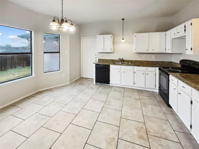 kitchen featuring pendant lighting, sink, black appliances, and white cabinets