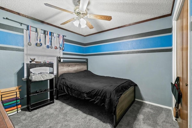 bedroom with ceiling fan, crown molding, a textured ceiling, and carpet flooring