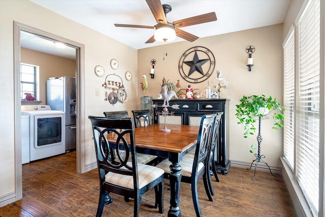 dining space featuring dark hardwood / wood-style floors, ceiling fan, and washer / clothes dryer