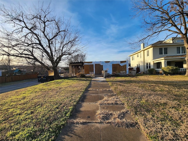 view of front of home with a front yard