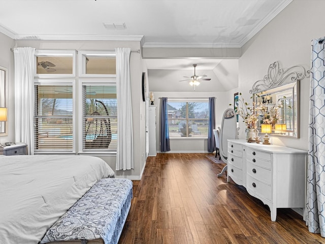 bedroom featuring crown molding, lofted ceiling, and dark hardwood / wood-style floors