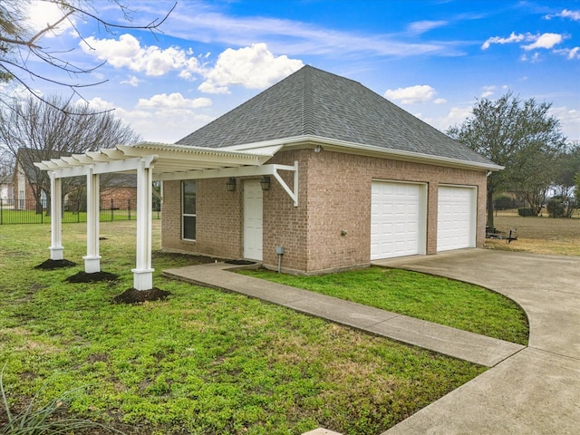 view of front of property with a garage and a front yard