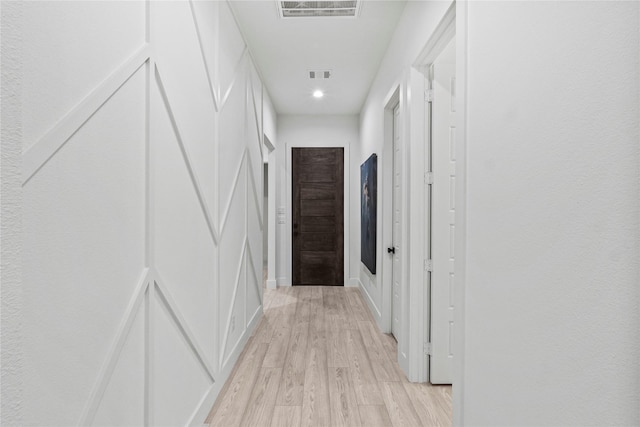 hallway featuring light hardwood / wood-style floors