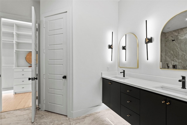 bathroom featuring vanity and walk in shower