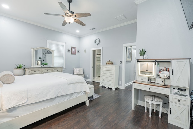 bedroom featuring ornamental molding, dark hardwood / wood-style floors, and ceiling fan