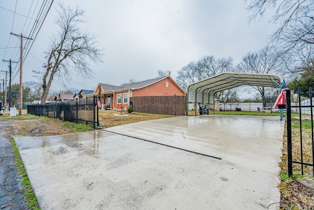 exterior space featuring a carport