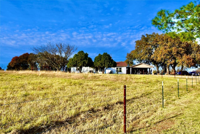 view of yard featuring a rural view