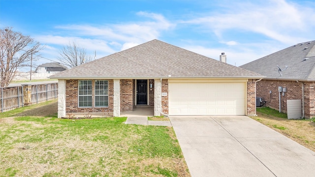 ranch-style house with central AC, a garage, and a front lawn