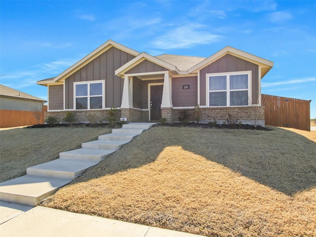 view of front of home with a front lawn