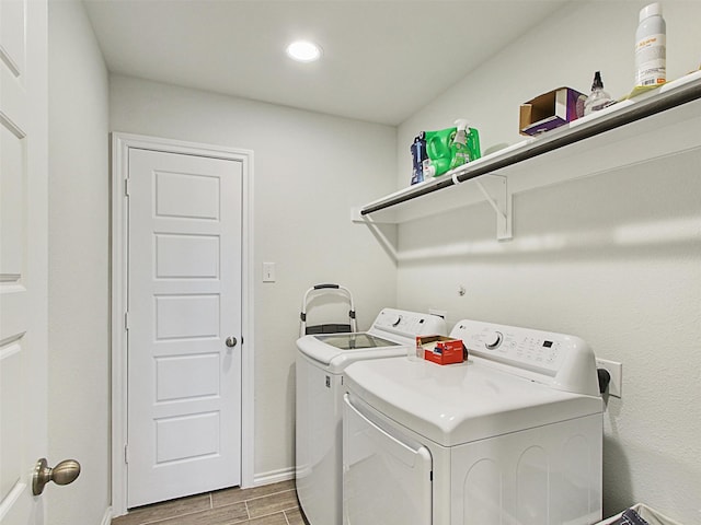 laundry room featuring washer and clothes dryer