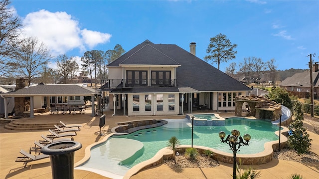 17729 Southpoint Rd, Whitehouse, TX 75791 - view of swimming pool with stairs, a patio, french doors, and a pool with connected hot tub