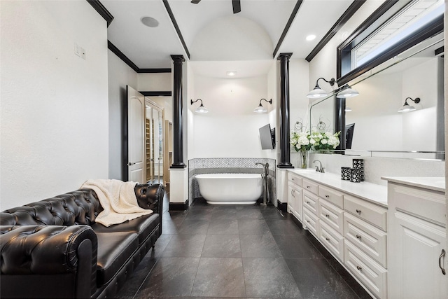 17729 Southpoint Rd, Whitehouse, TX 75791 - bathroom featuring double vanity, a soaking tub, baseboards, crown molding, and recessed lighting