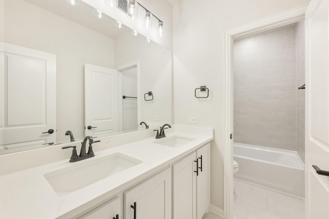 full bathroom with shower / tub combination, vanity, and toilet