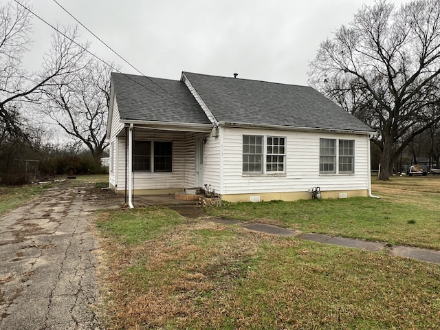 exterior space with a front yard