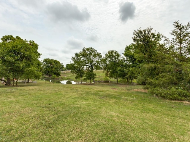 view of yard with a water view