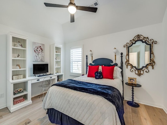 bedroom featuring vaulted ceiling, ceiling fan, and light hardwood / wood-style flooring