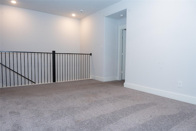 empty room featuring carpet flooring