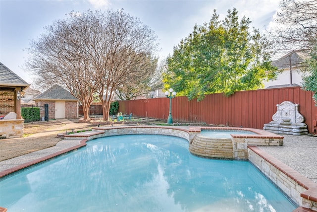 7405 Sugarbush Dr, Garland, TX 75044 - view of swimming pool with a pool with connected hot tub and a fenced backyard