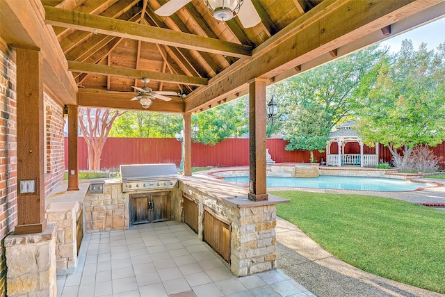 7405 Sugarbush Dr, Garland, TX 75044 - fenced backyard featuring a gazebo, area for grilling, a ceiling fan, and a patio