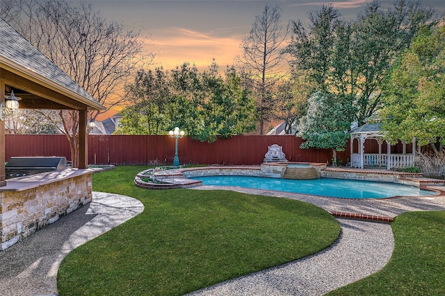 7405 Sugarbush Dr, Garland, TX 75044 - pool at dusk featuring a gazebo, a fenced backyard, area for grilling, and a pool with connected hot tub