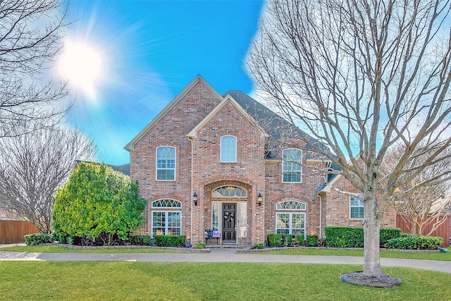 7405 Sugarbush Dr, Garland, TX 75044 - traditional-style home featuring brick siding