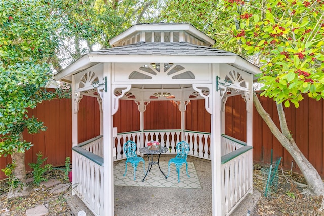 view of patio with a gazebo and fence