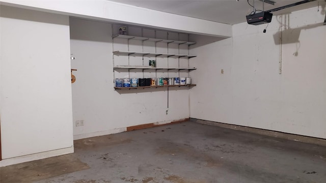 1802 SE 26th Ave, Mineral Wells, TX 76067 - garage with a garage door opener and baseboards