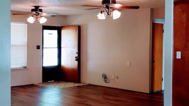 1802 SE 26th Ave, Mineral Wells, TX 76067 - foyer entrance with ceiling fan and wood finished floors