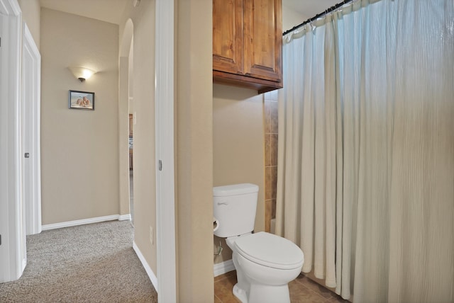 bathroom featuring toilet