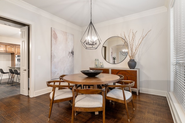 dining room with an inviting chandelier, ornamental molding, and dark hardwood / wood-style floors