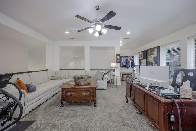 carpeted living room featuring ceiling fan