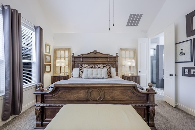 carpeted bedroom featuring lofted ceiling