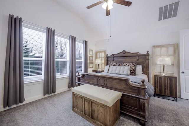 carpeted bedroom with ceiling fan and lofted ceiling