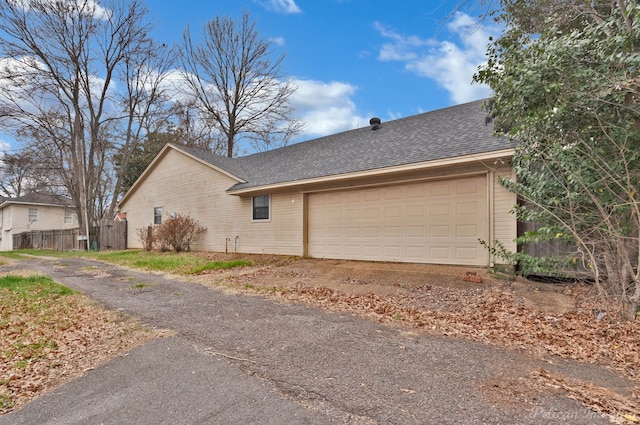 view of home's exterior with a garage