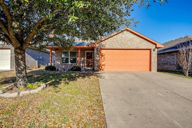 414 Tinker Trl, Burleson, TX 76028 - single story home featuring an attached garage, brick siding, and concrete driveway