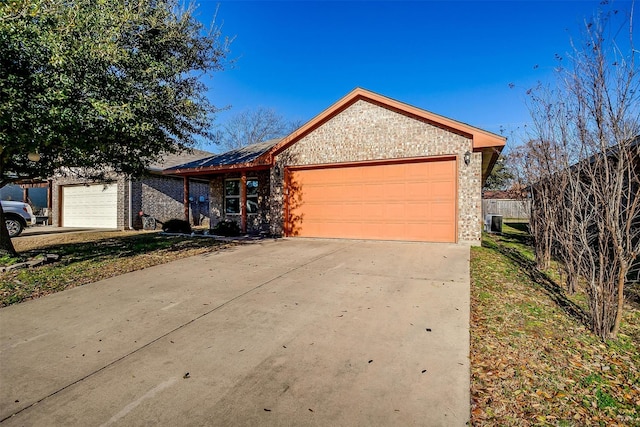 single story home featuring a garage