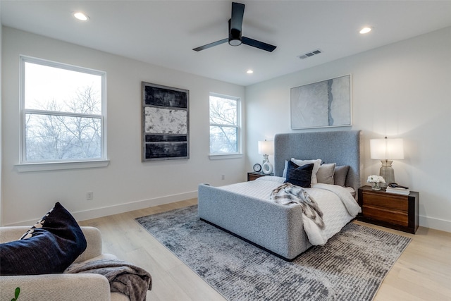 417 Wayne St, Dallas, TX 75223 - bedroom with light wood finished floors, visible vents, and recessed lighting