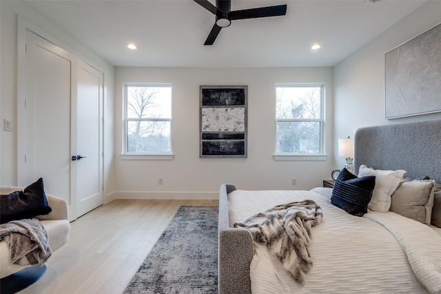 417 Wayne St, Dallas, TX 75223 - bedroom featuring baseboards, recessed lighting, light wood-style floors, and ceiling fan