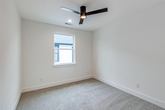417 Wayne St, Dallas, TX 75223 - spare room featuring baseboards, a ceiling fan, visible vents, and carpet