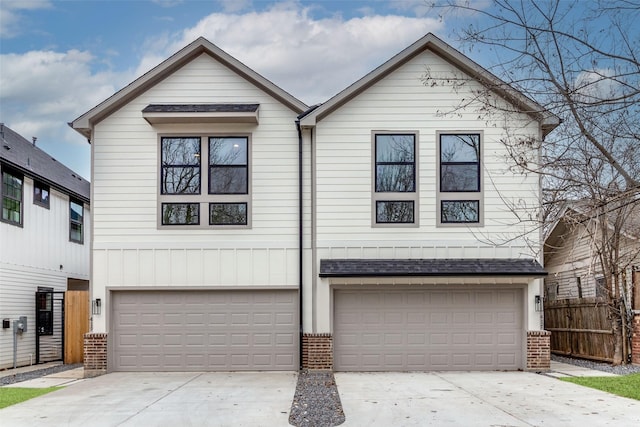 417 Wayne St, Dallas, TX 75223 - view of front facade featuring an attached garage, driveway, and brick siding